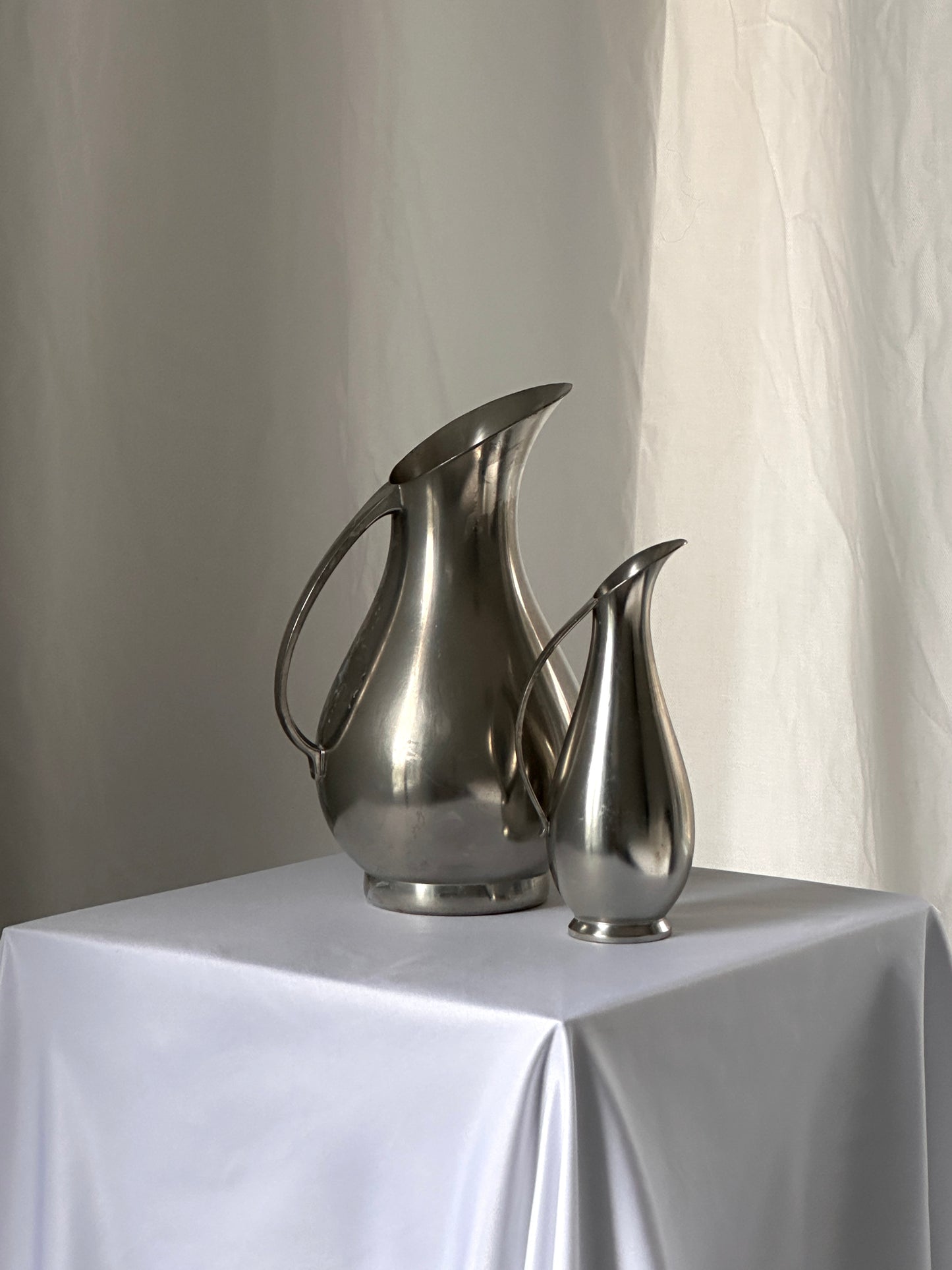 Pair of Mid Century Pewter Pitchers