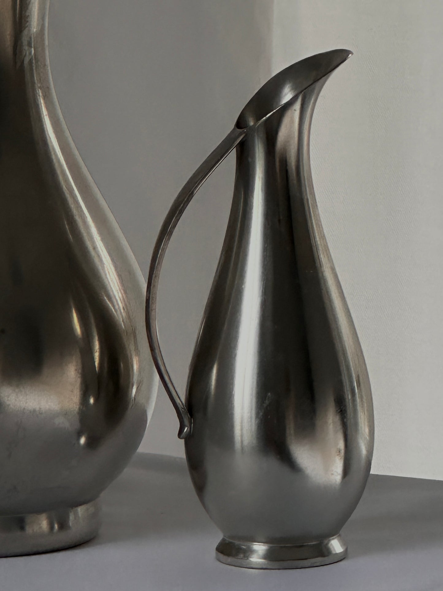 Pair of Mid Century Pewter Pitchers