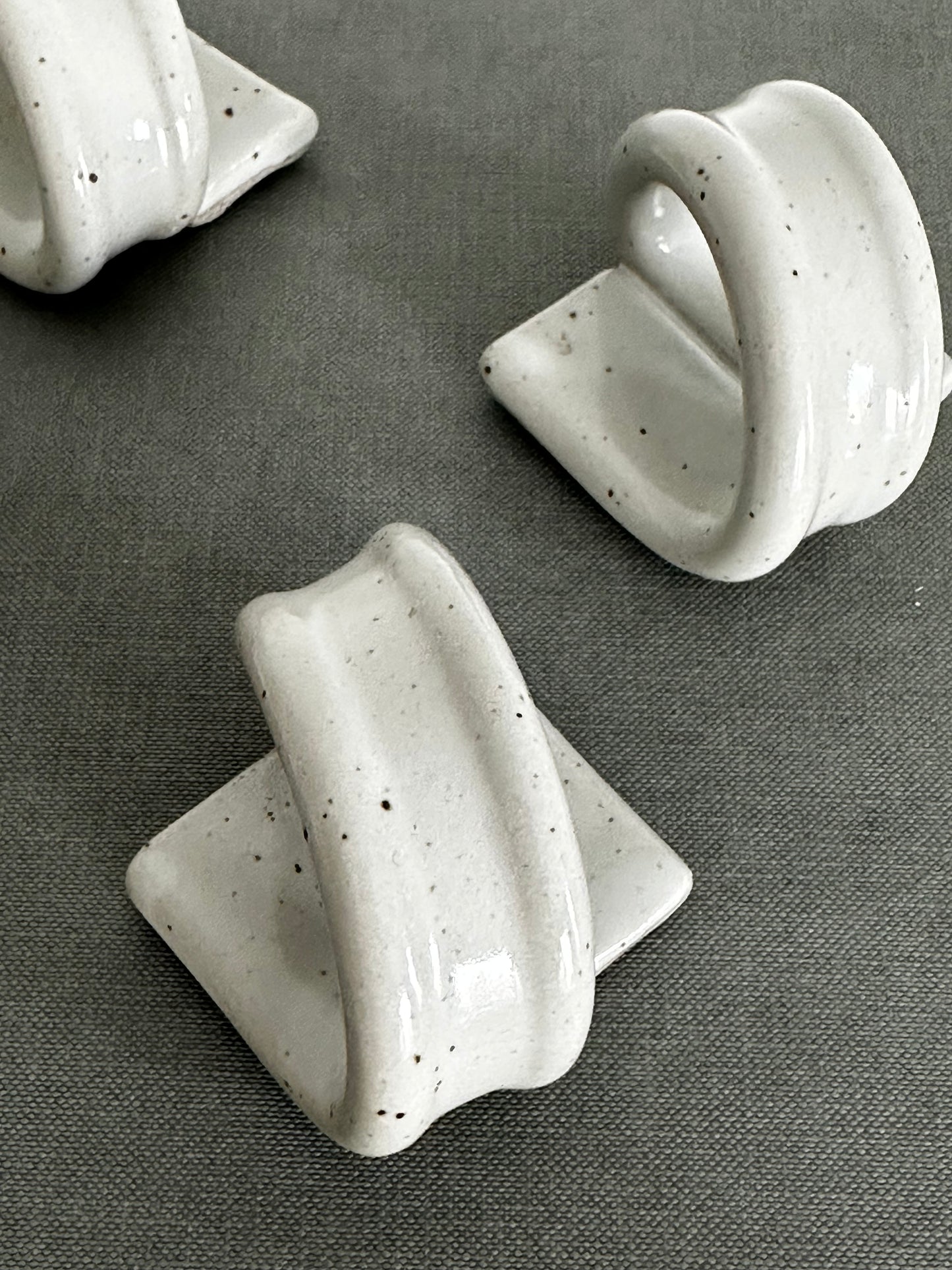 Freckled light gray ceramic vintage napkin rings (set of 4)