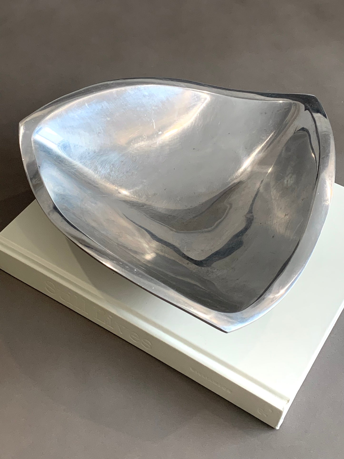 Silver metal sculptural catchall 