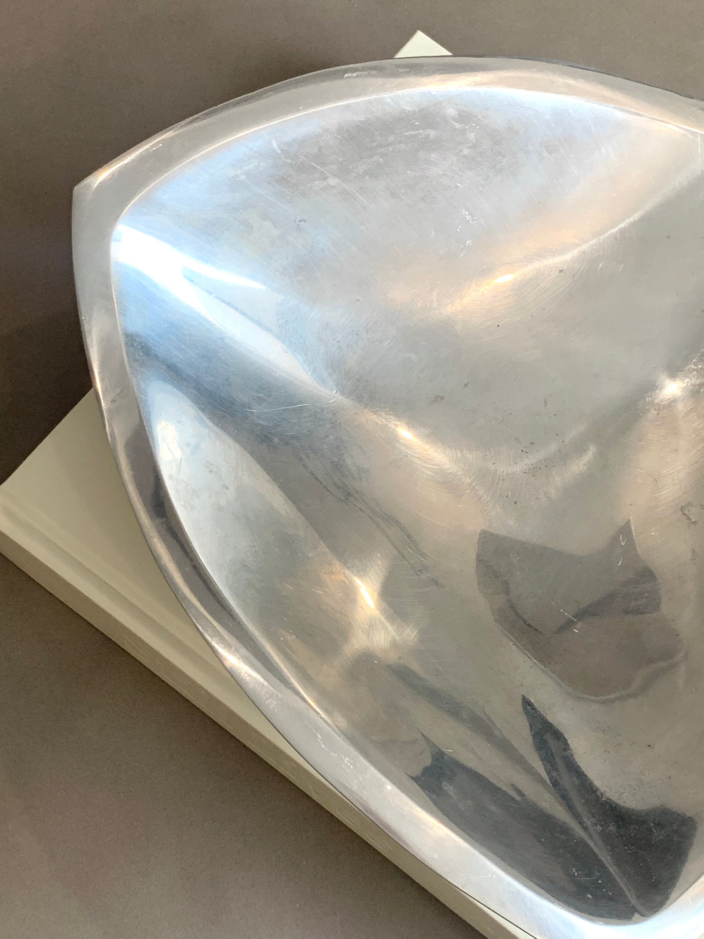 Silver metal sculptural catchall 